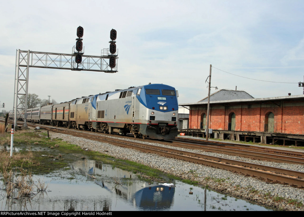 AMTK 4 leads train P092-29 past the signals at Charlie Baker